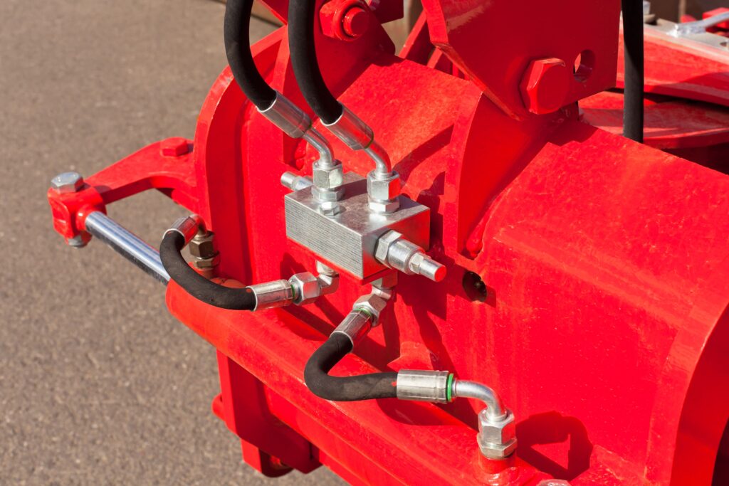 Hydraulic System Hoses on Farm Machine. Horizontal shot.